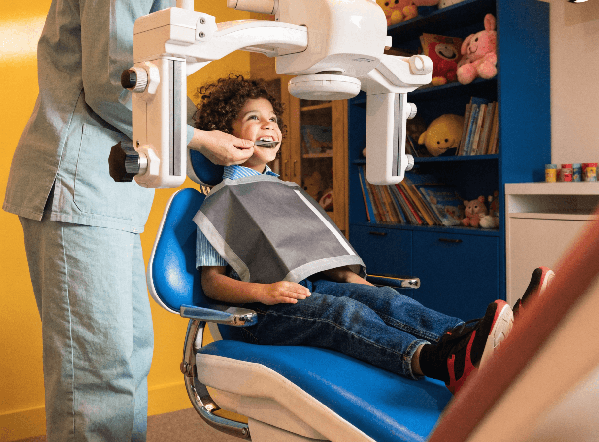 Child smiling while getting dental x-rays at Tooth Time Dentistry Hartford CT